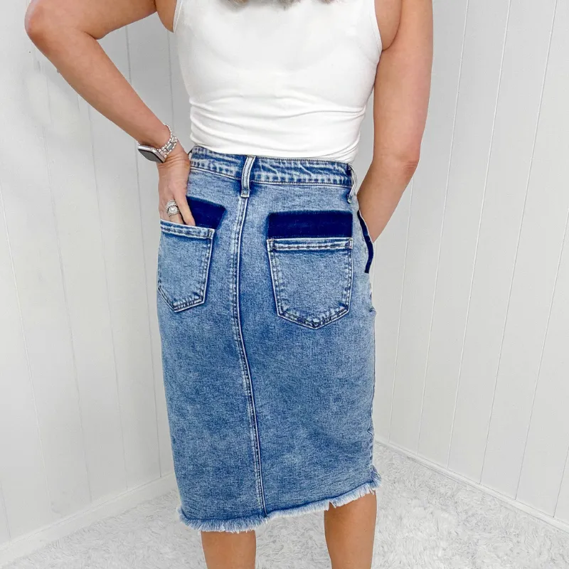 Sure! Here’s an optimized title for the product:

Blakeley Courtney Stylish Denim Skirt with Button and Slit Detail

This title includes modifiers to enhance clarity and appeal while highlighting key features of the product.